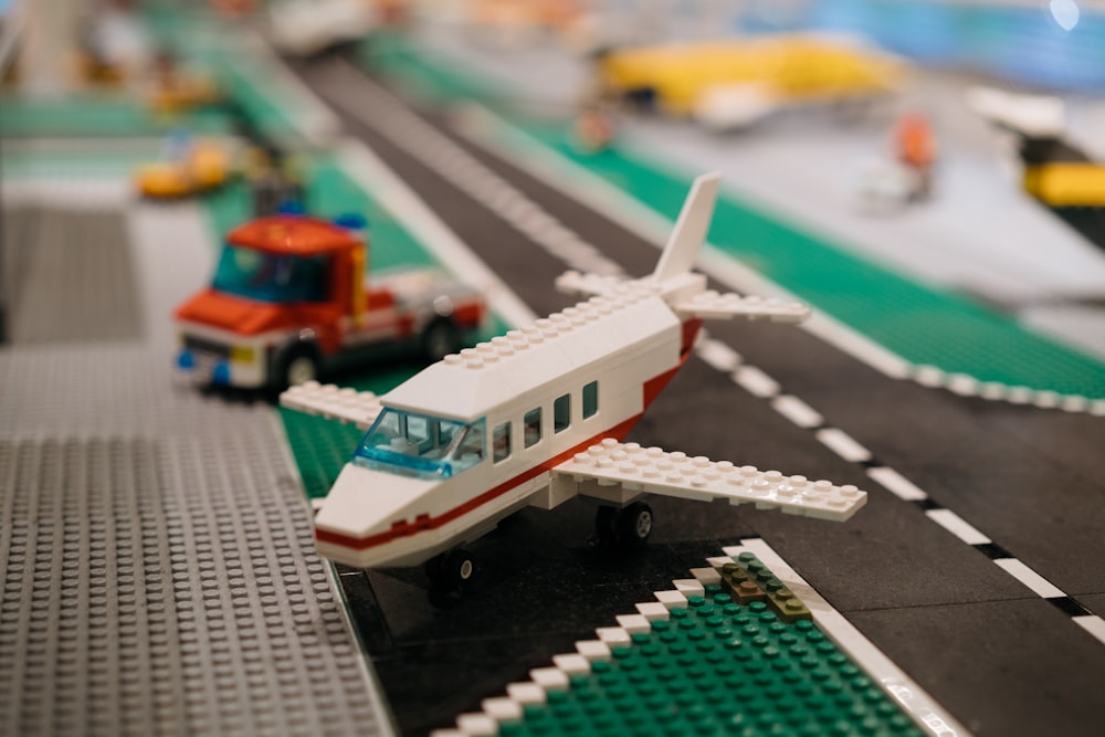 a lego model of a small airplane on a runway