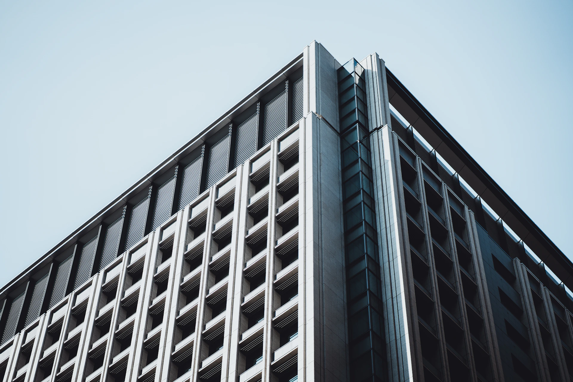 a tall building with lots of windows on top of it