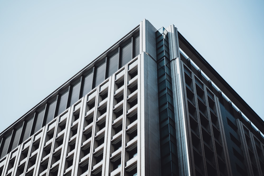 a tall building with lots of windows on top of it