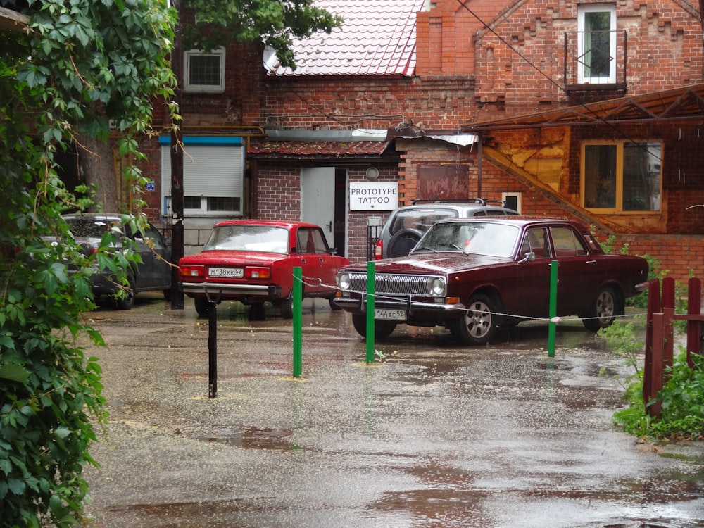 a couple of cars that are parked in the street