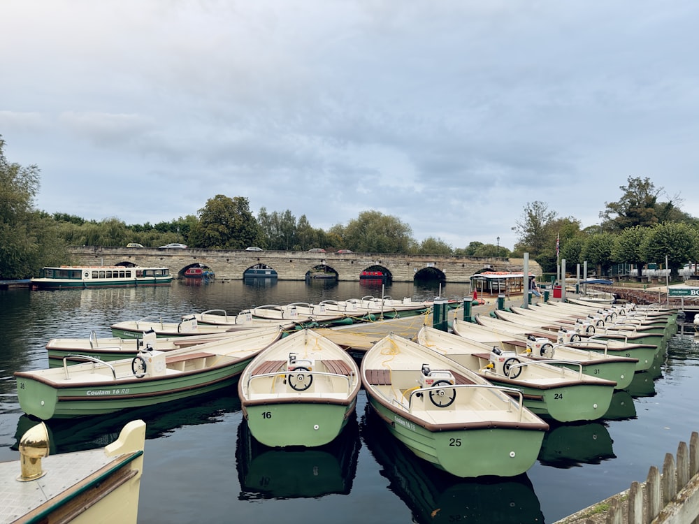 a bunch of boats that are sitting in the water