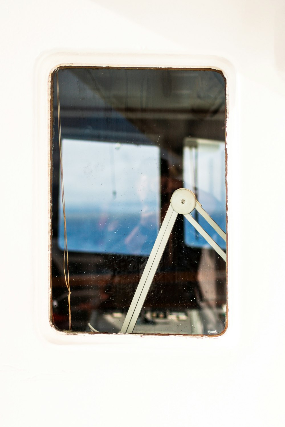 a close up of a window on a boat