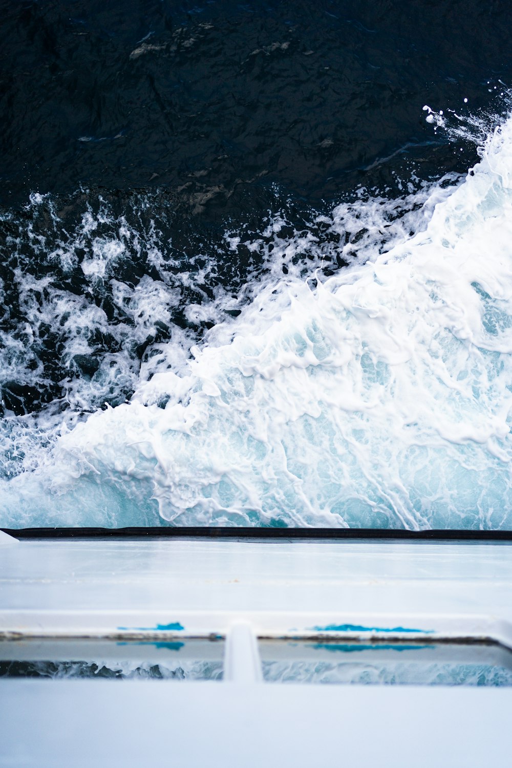 a view of the ocean from the top of a boat