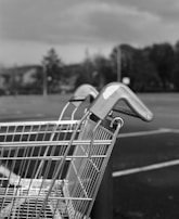 A close-up of a shopping cart icon on a smartphone screen.