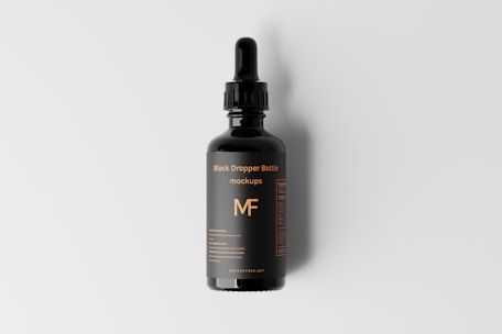 a bottle of mf hair growth oil on a white background