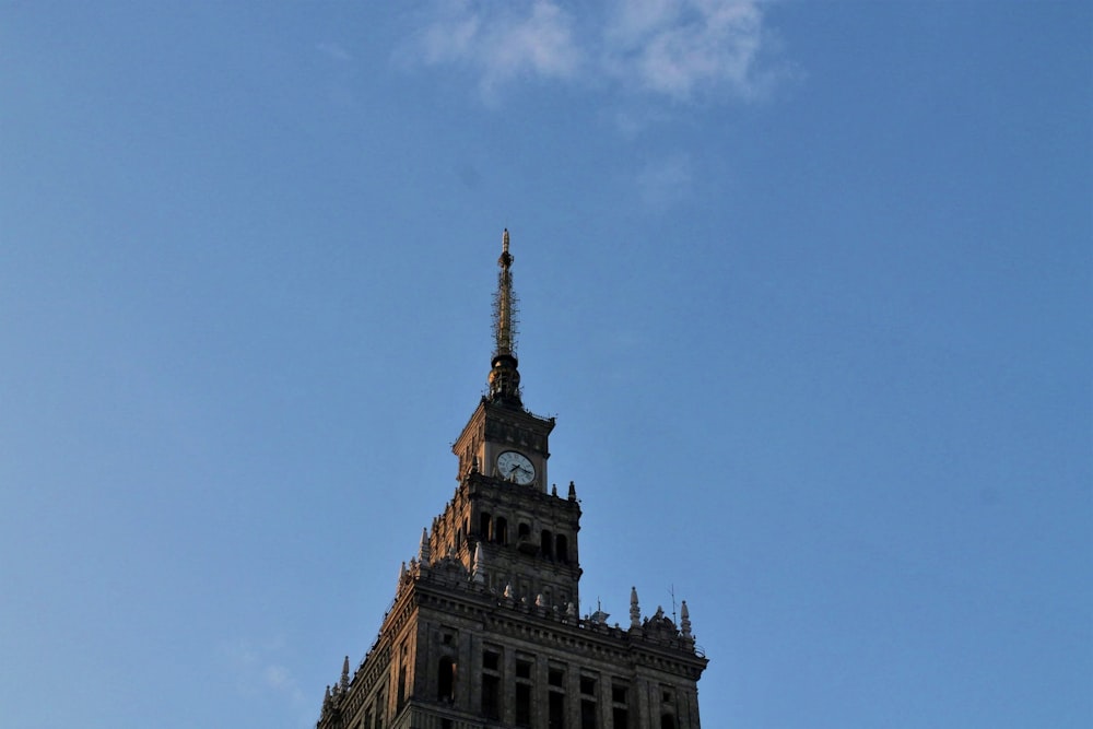 a tall clock tower with a sky background