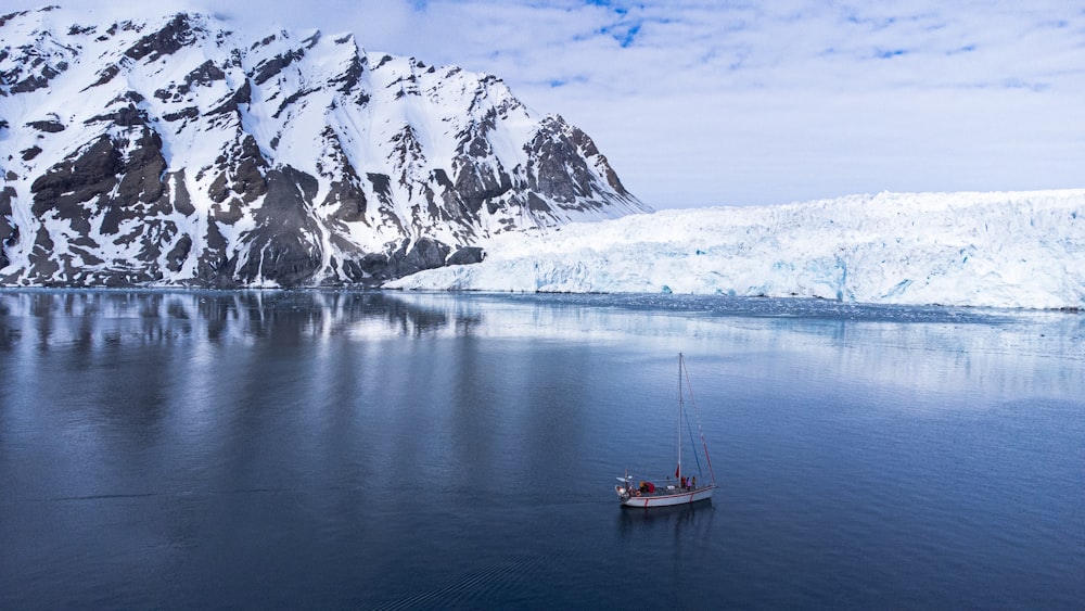 a small boat in a large body of water