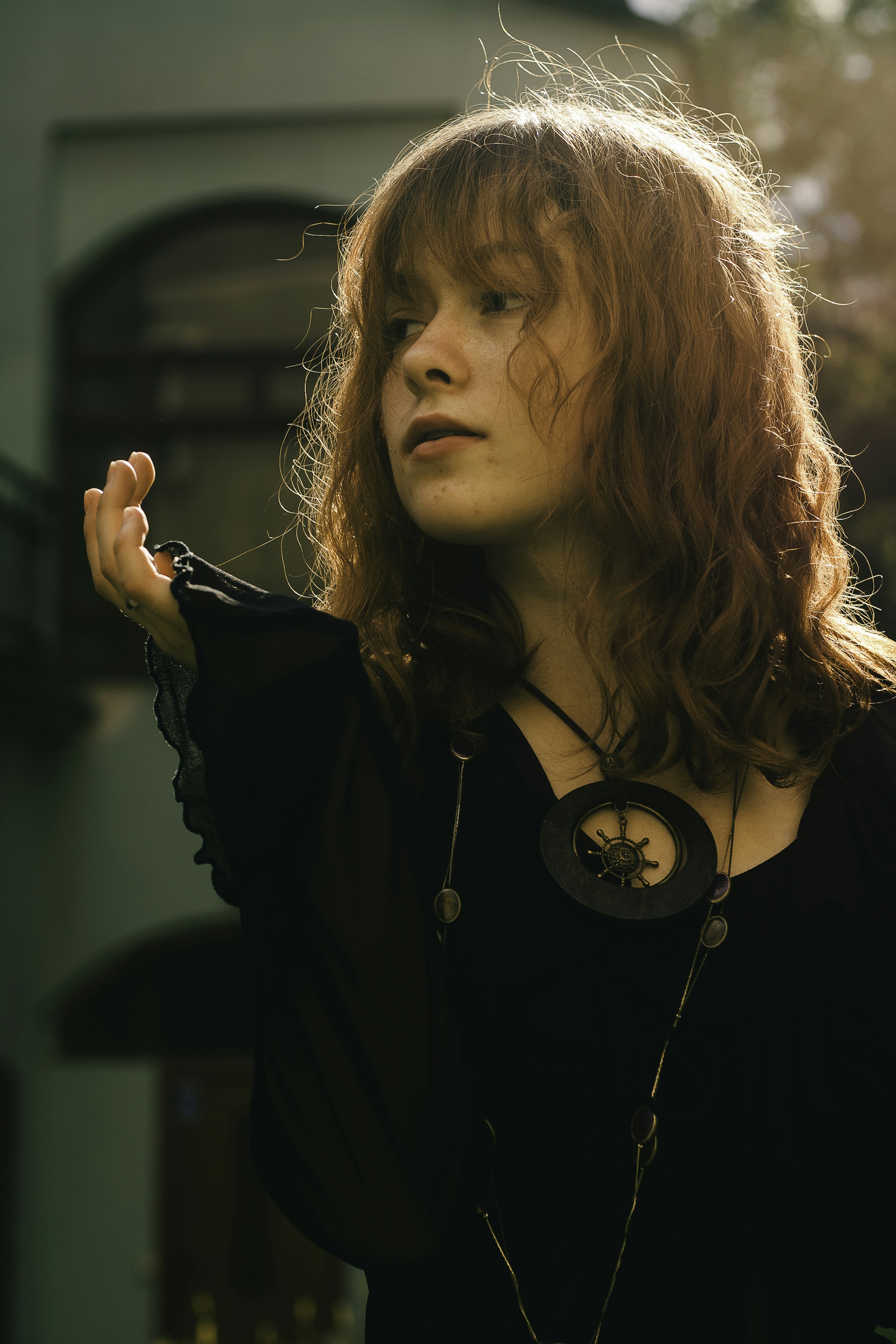 A woman with red hair and a black shirt photo – Free Woman Image on ...