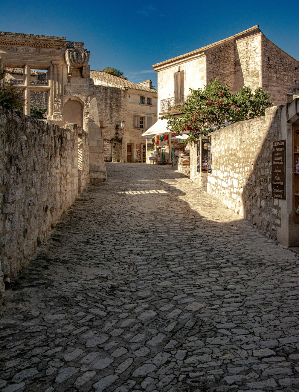 a cobblestone street in a small village