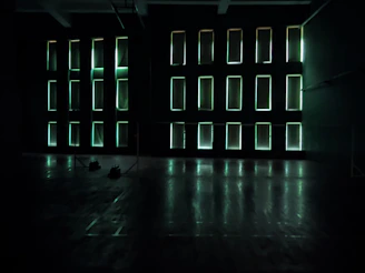 A sleek modern LED panel light softly illuminating a stylish, minimalist living room.