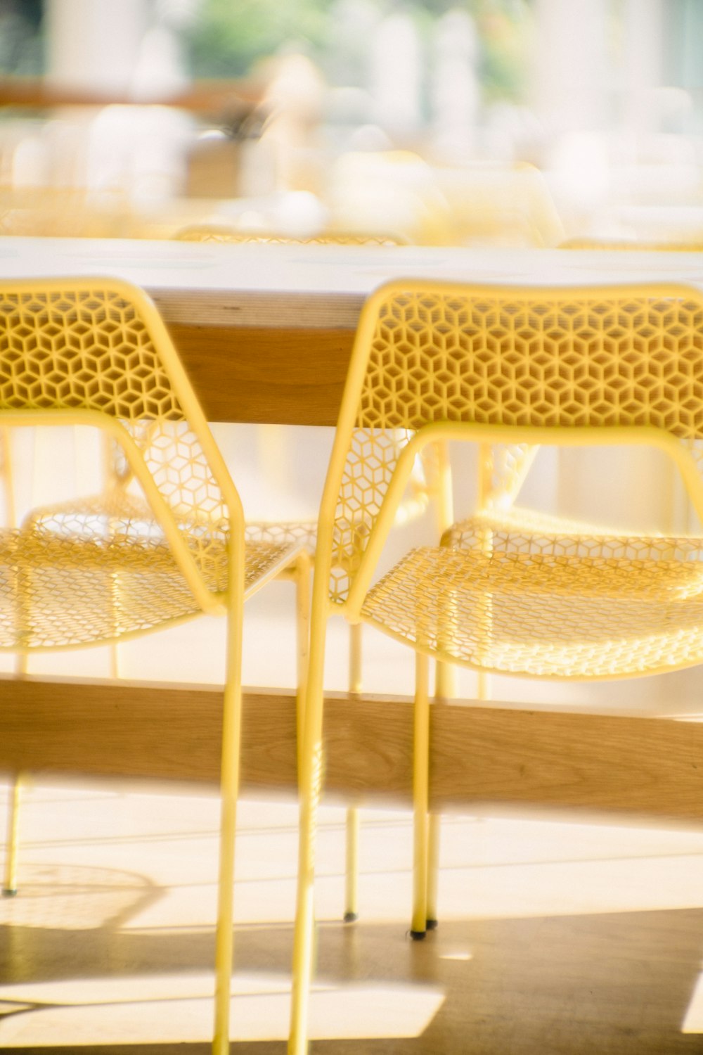 a couple of yellow chairs sitting next to each other
