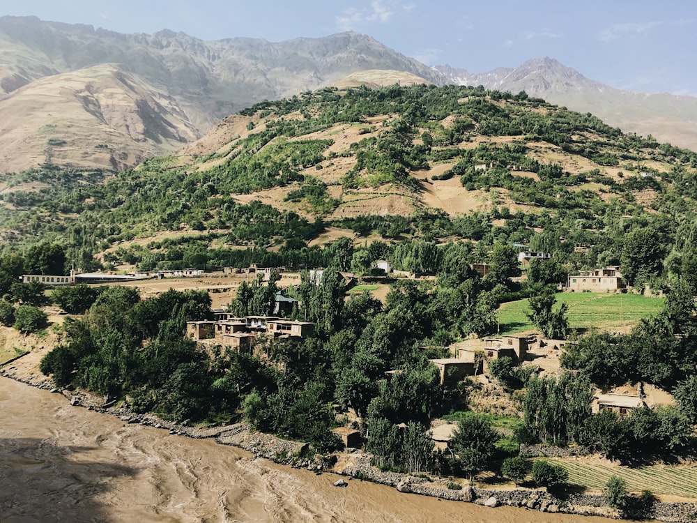 a hill with a village on top of it