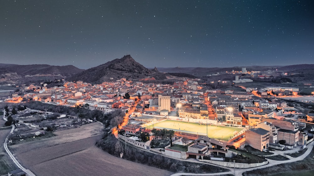 an aerial view of a city at night