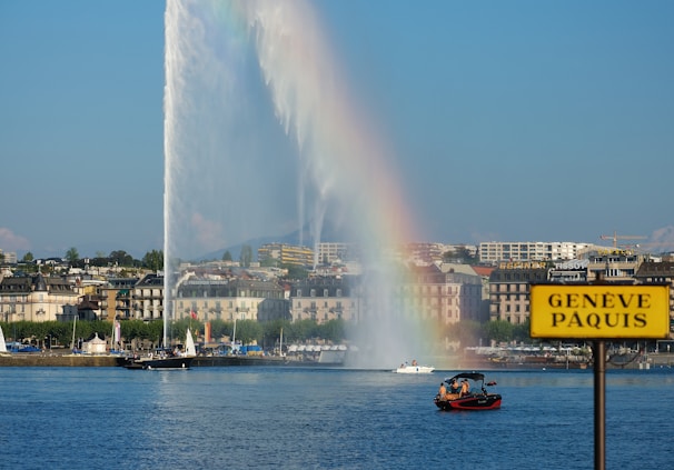 Elegant cafes along the Geneva waterfront bustling with travelers and locals alike.