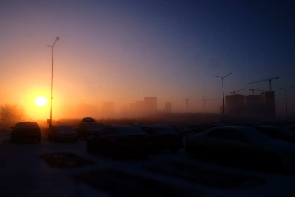 a parking lot filled with lots of parked cars