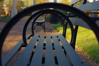 Urban park benches and railings made from perforated metal, blending durability with design.