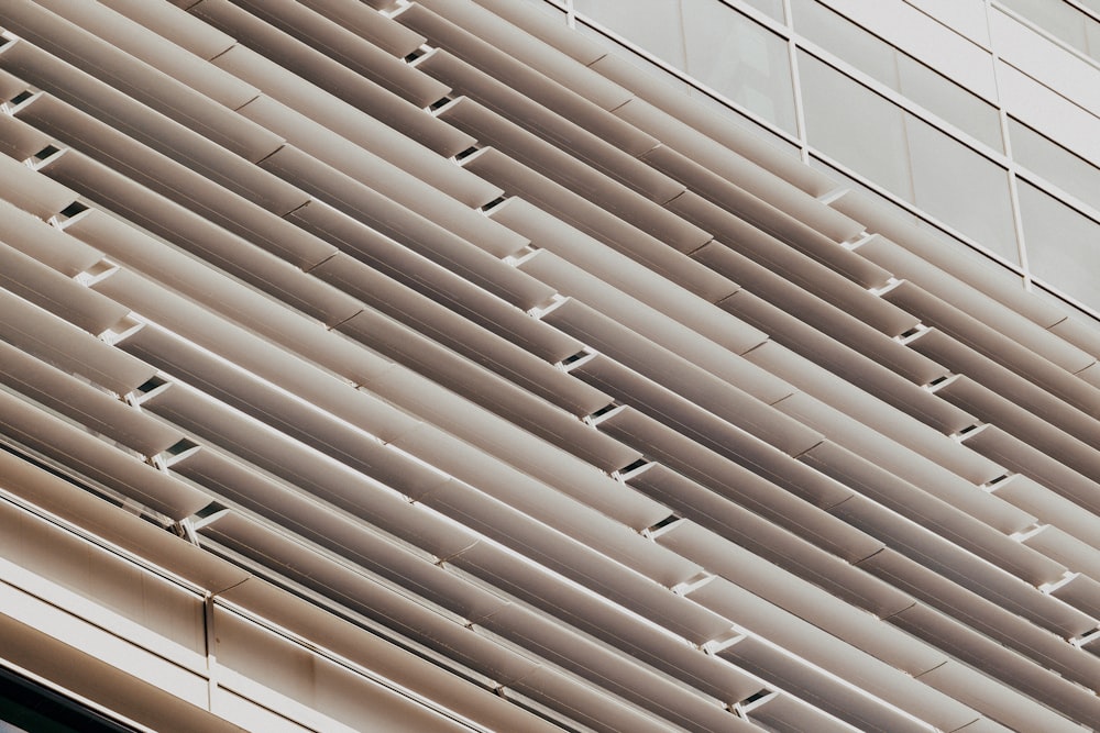 a close up of a building with a clock on the side of it