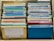 A collection of colorful floppy disks is organized in a storage box. The disks come in various colors, including blue, green, yellow, and red. A prominent yellow disk in the front has the word 'Programs' handwritten on a label and features the TDK branding.