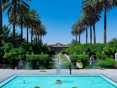 Lush tropical garden surrounding a quaint fountain in the heart of the property.