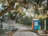 Technicians installing a Geoflush bio toilet at a remote village location.