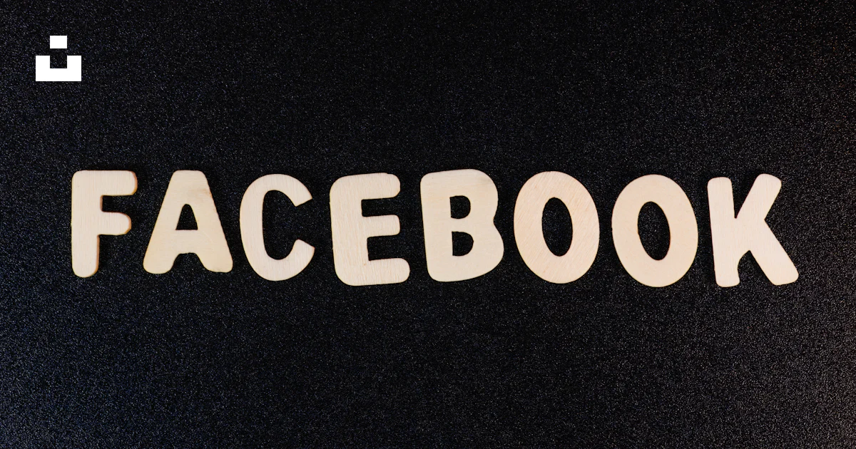 The word facebook spelled with white letters on a black background ...