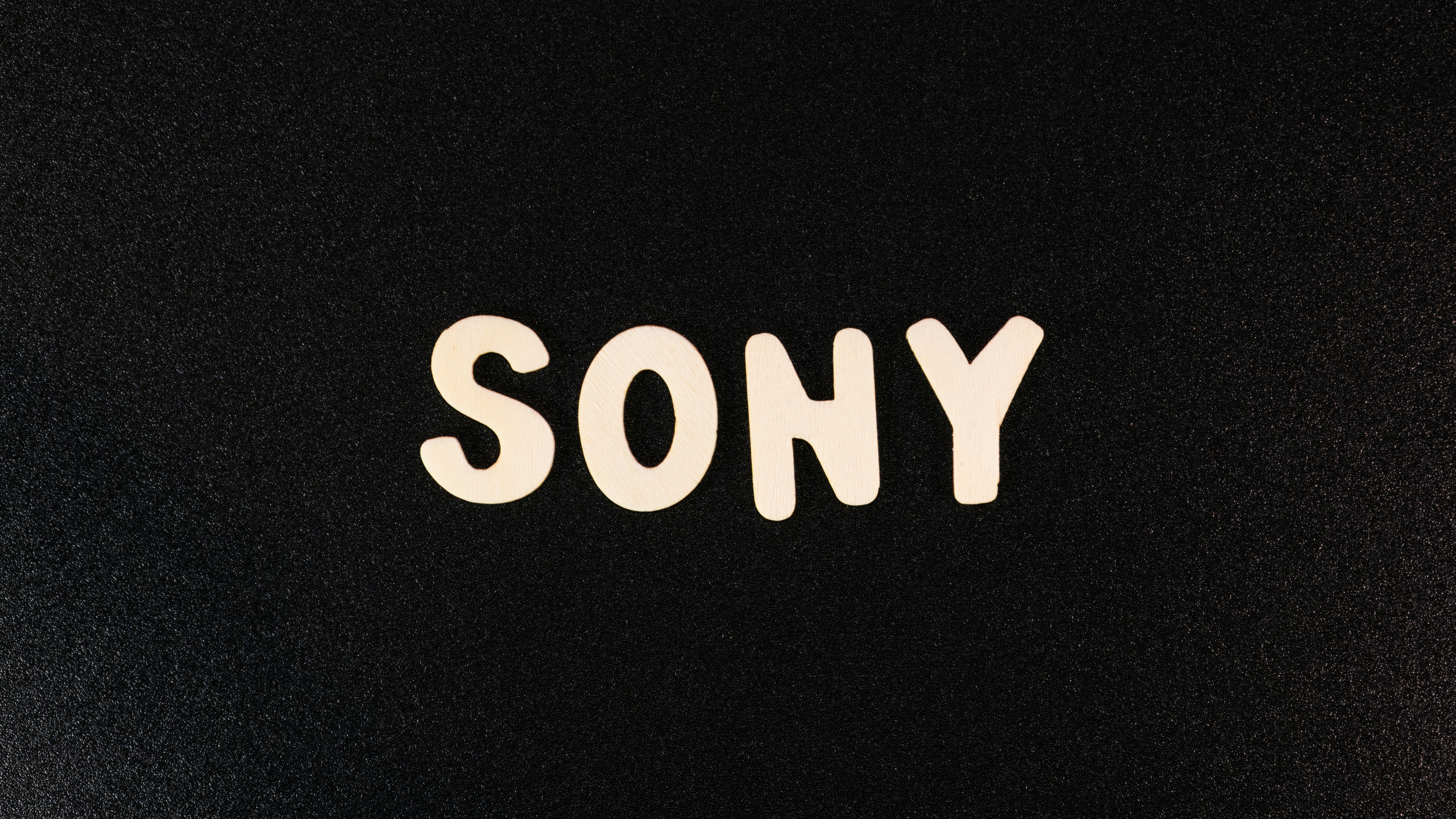 the word sony written in white on a black background