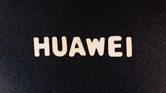 White letters spelling 'HUAWEI' are centered on a black background.