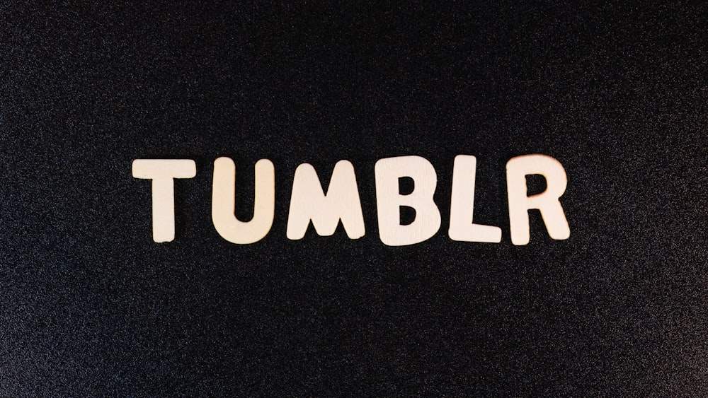 the word tumblr written in white letters on a black background