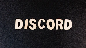 A vibrant Discord logo with chat bubbles, highlighting community connection.