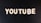 The word 'YOUTUBE' is displayed in white, bold, block letters against a black textured background.