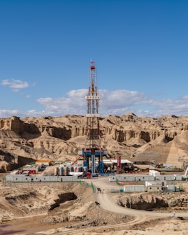 a drilling rig in the middle of a desert