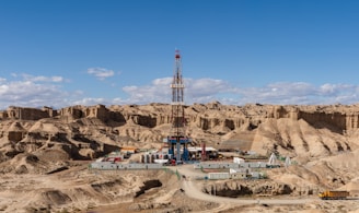 a drilling rig in the middle of a desert
