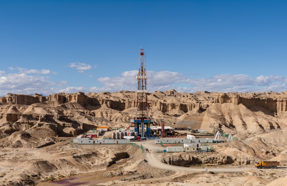 a drilling rig in the middle of a desert