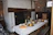 A cozy dining setup in a rustic Savoyard farmhouse.