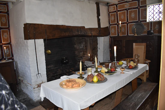 Cozy rustic kitchen table with traditional Portuguese dishes and regional ingredients from Serra da Lousã.