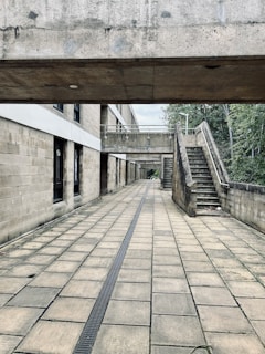 Wide shot of an outdoor walkway showcasing smooth, well-painted concrete surfaces.