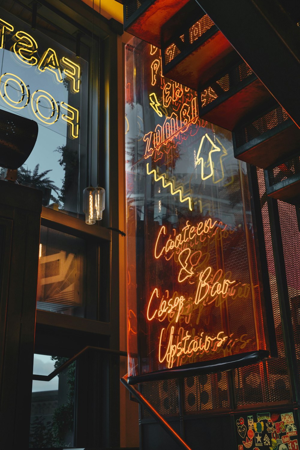 a neon sign on the side of a building