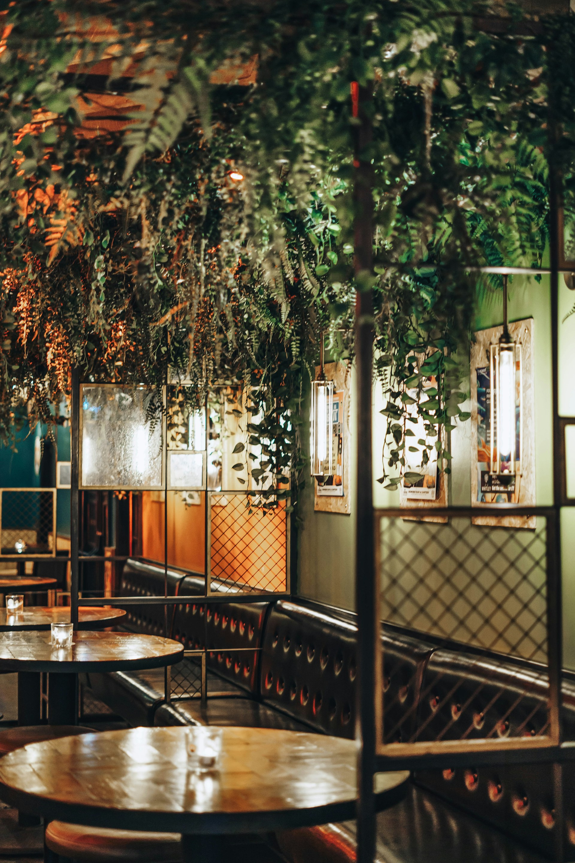 A cozy dining area at Theiven Cafe, featuring traditional Indian decor and inviting ambiance.