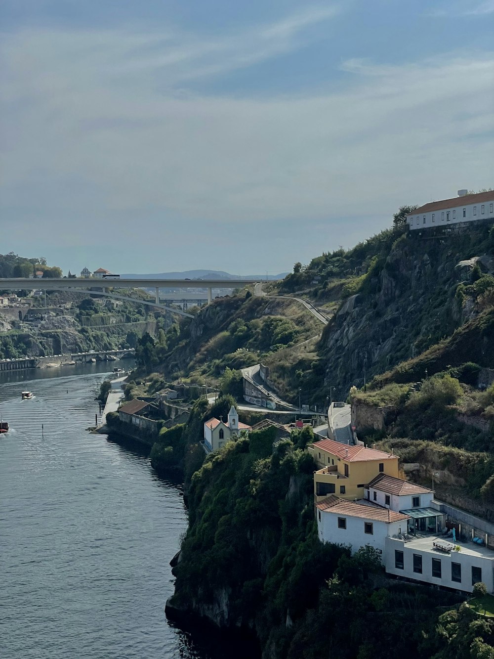 a body of water with houses on the side of it