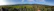 A panoramic view of the spacious 12,000 square meter land area under clear blue skies.
