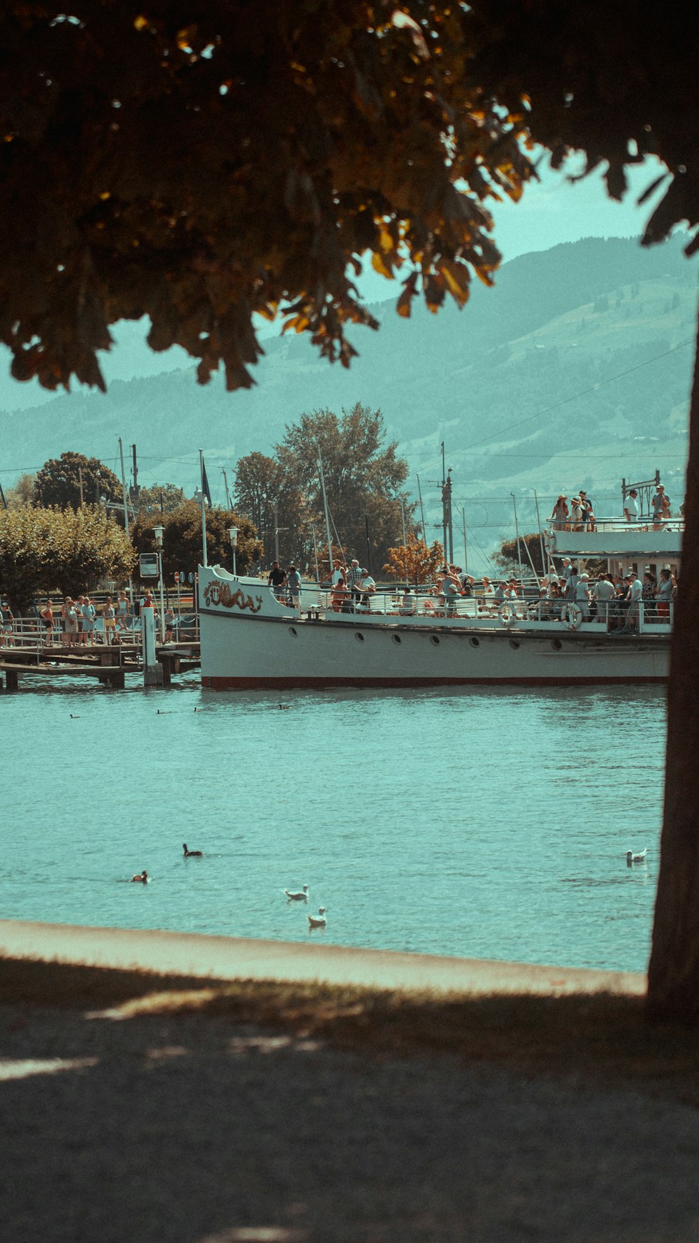 a large boat floating on top of a body of water