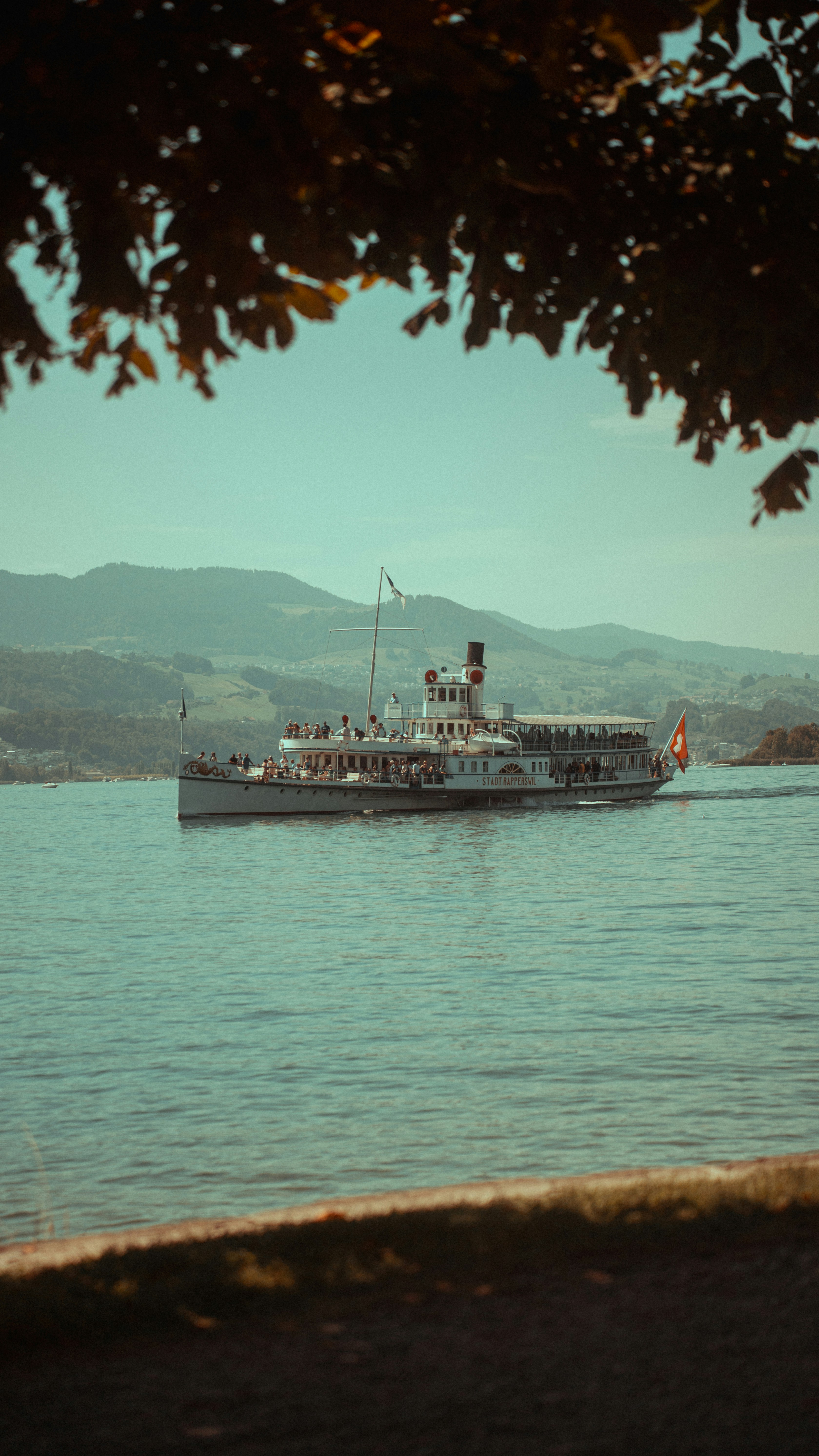 a large boat traveling across a large body of water