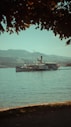 a large boat traveling across a large body of water