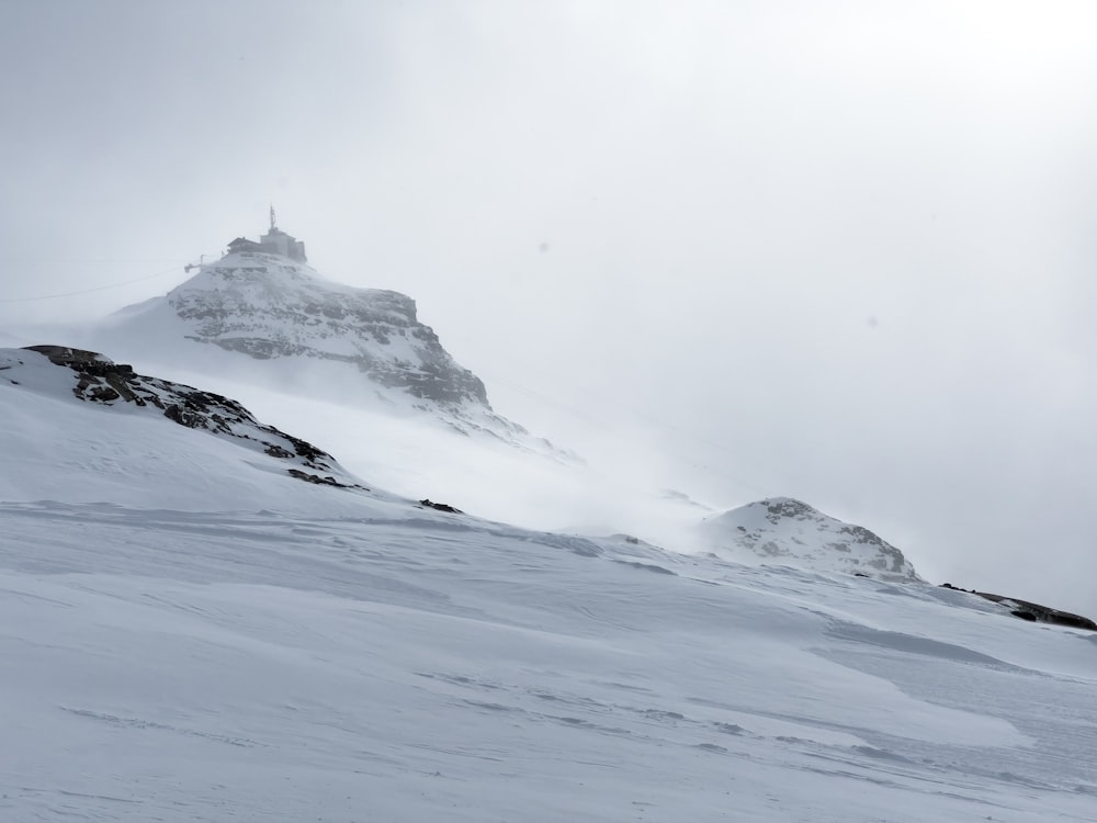 a person skiing down a snow covered mountain