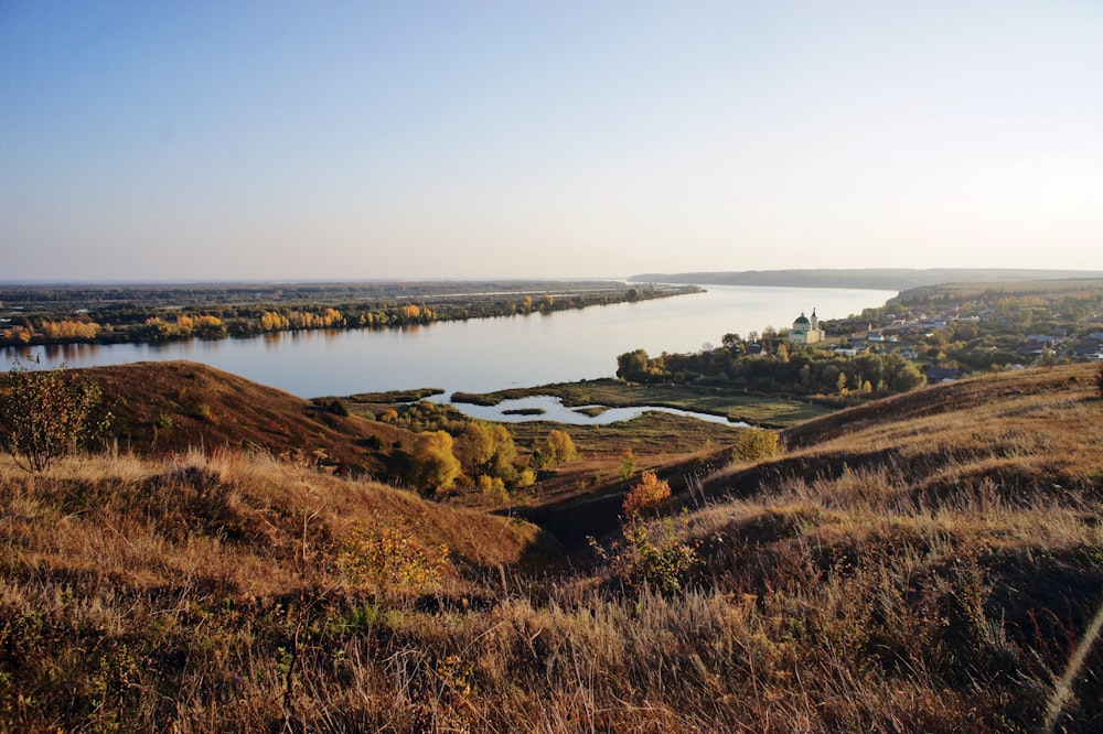 a view of a body of water from a hill