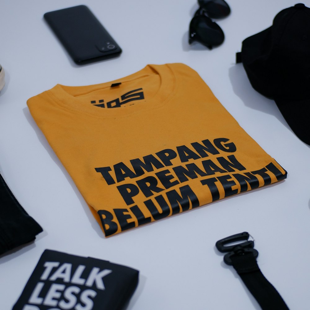 a yellow tshirt that says tappang premnan belum test