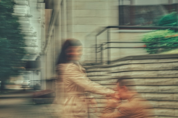 A candid moment frozen in time, highlighting human connection in urban life.