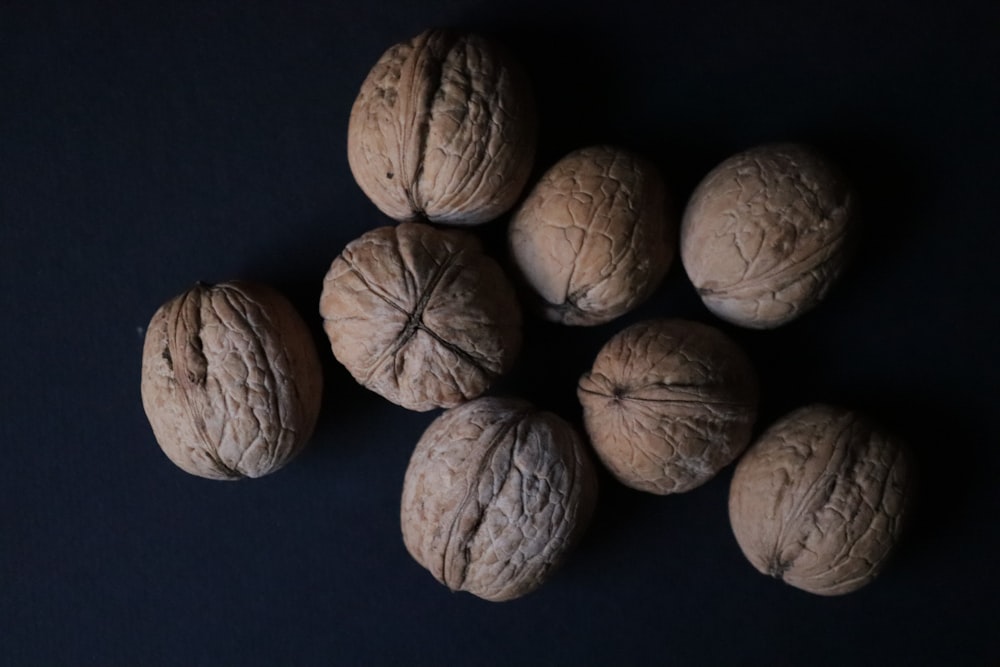 a group of nuts sitting on top of a table