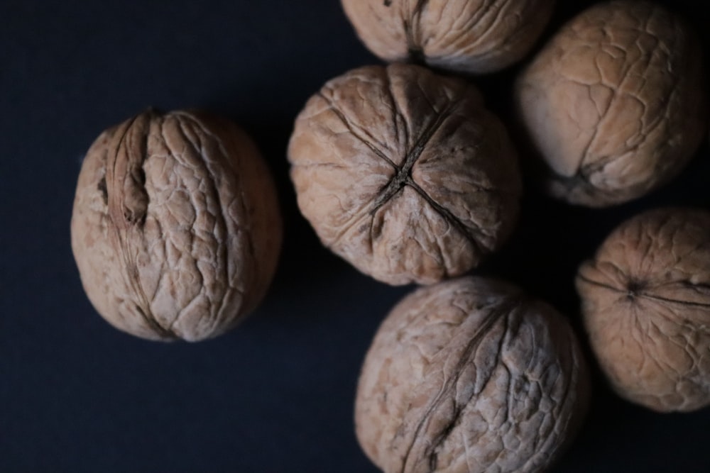 a group of walnuts sitting on top of a table