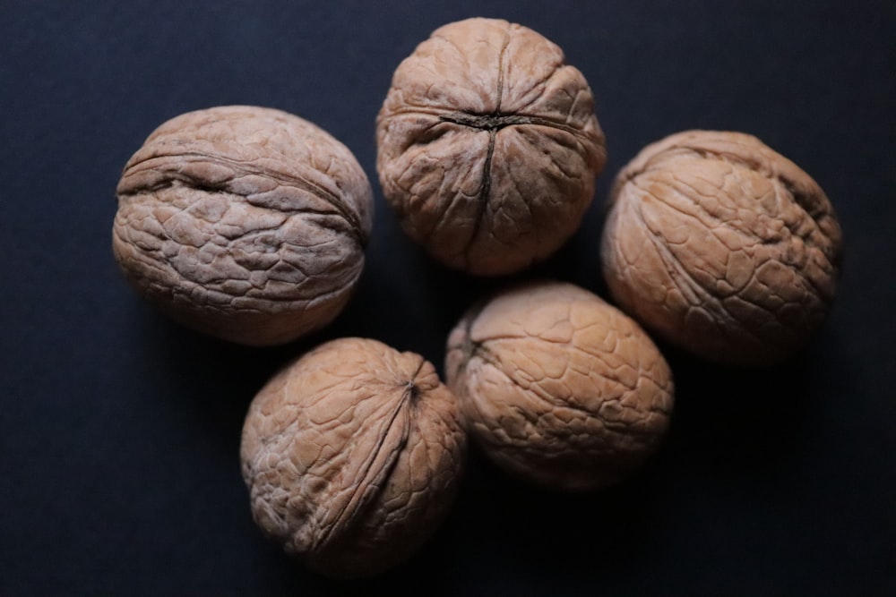 a group of nuts sitting on top of a table